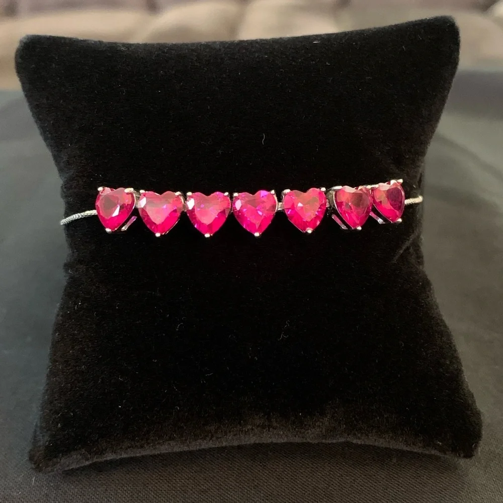 Rhodium over sterling silver lab ruby heart bolo bracelet